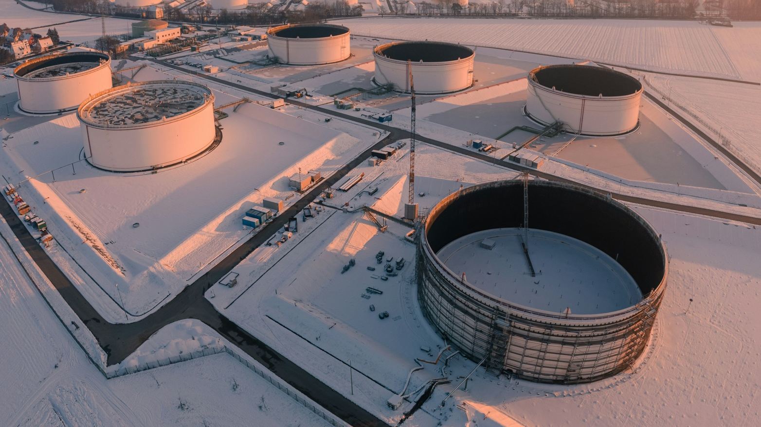 Aerial view of a tank farm in snow